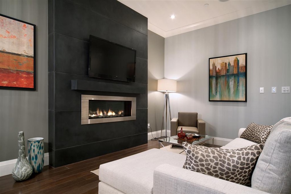 Inspiration for a mid-sized transitional enclosed dark wood floor family room remodel in Vancouver with gray walls, a ribbon fireplace, a tile fireplace and a wall-mounted tv