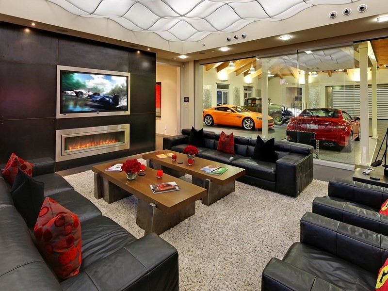 Inspiration for a modern enclosed games room in Seattle with multi-coloured walls, a ribbon fireplace and a built-in media unit.