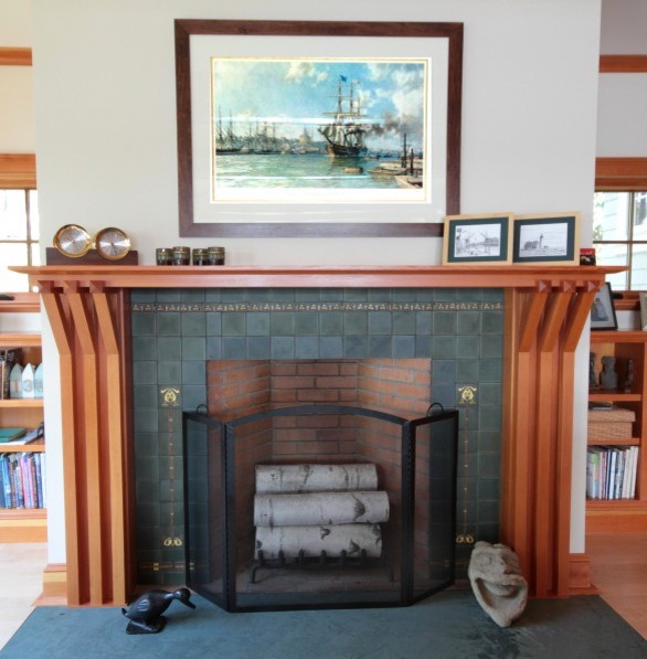 Large classic enclosed games room in Portland Maine with white walls, light hardwood flooring, a standard fireplace and a tiled fireplace surround.