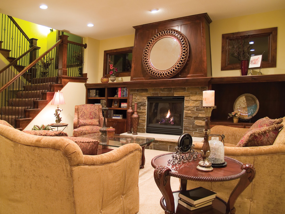 Elegant family room photo in St Louis with a stone fireplace