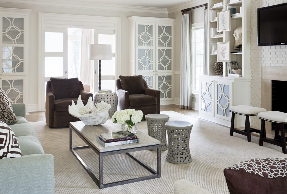 Family room - mid-sized transitional open concept family room idea in Little Rock with beige walls, a standard fireplace, a wall-mounted tv and a stone fireplace