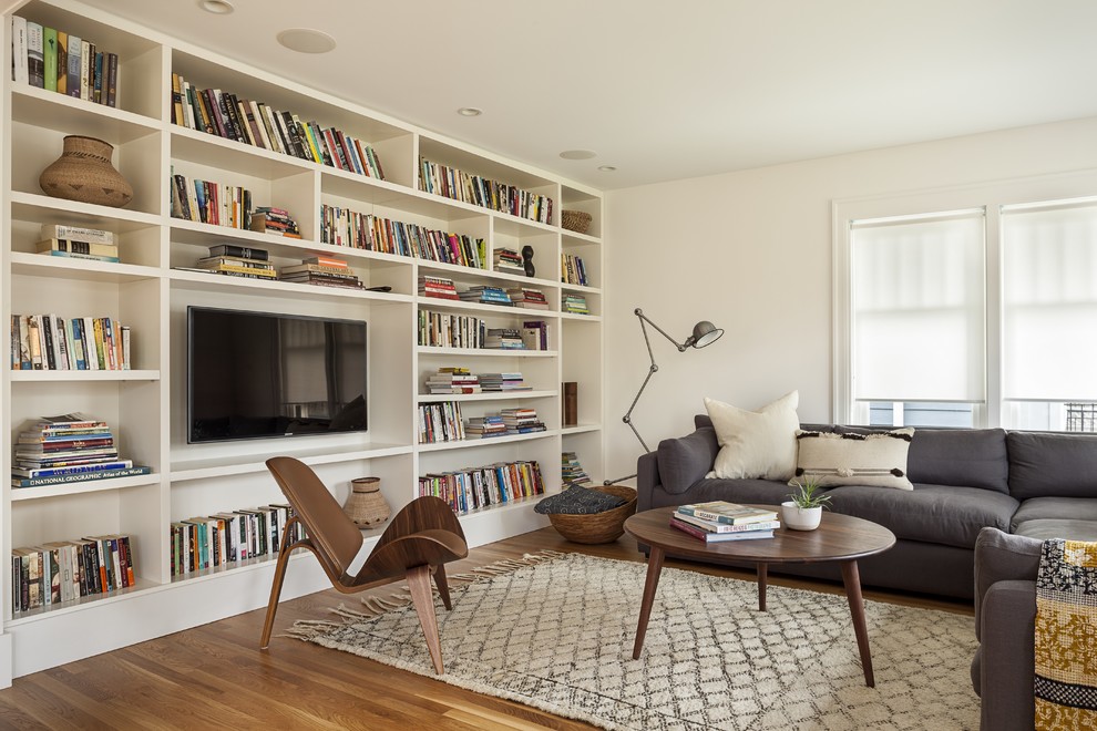 Ejemplo de sala de estar minimalista con alfombra