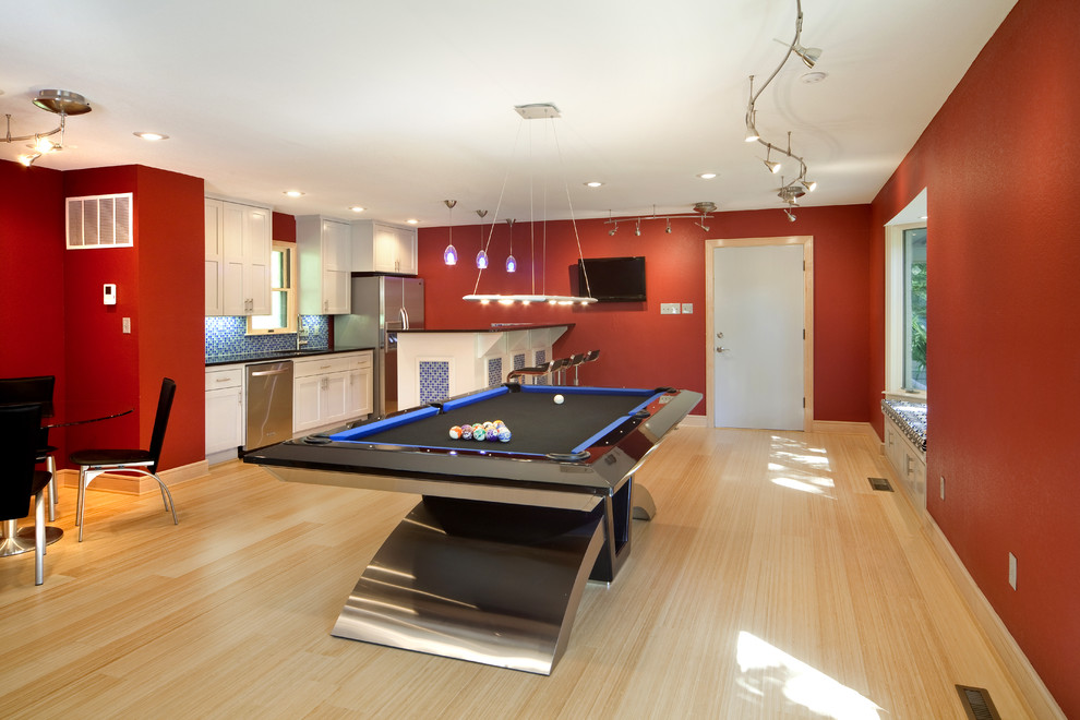 Inspiration for a contemporary family room remodel in Little Rock with red walls