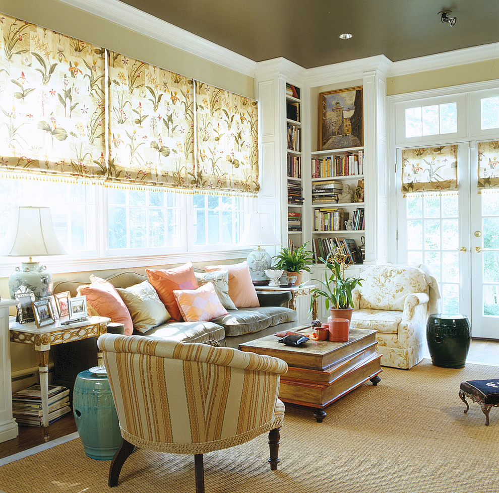 Photo of a traditional living room in DC Metro with a reading nook and beige walls.