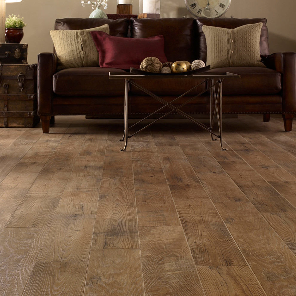 Inspiration for an industrial laminate floor family room remodel in Baltimore with beige walls