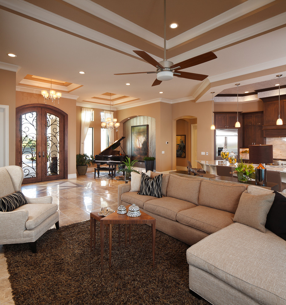 This is an example of a traditional open plan games room in Orlando with beige walls, porcelain flooring and beige floors.