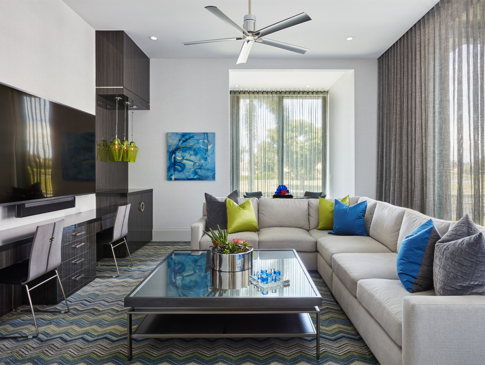 Esempio di un soggiorno minimal aperto con pareti bianche, moquette e pavimento multicolore