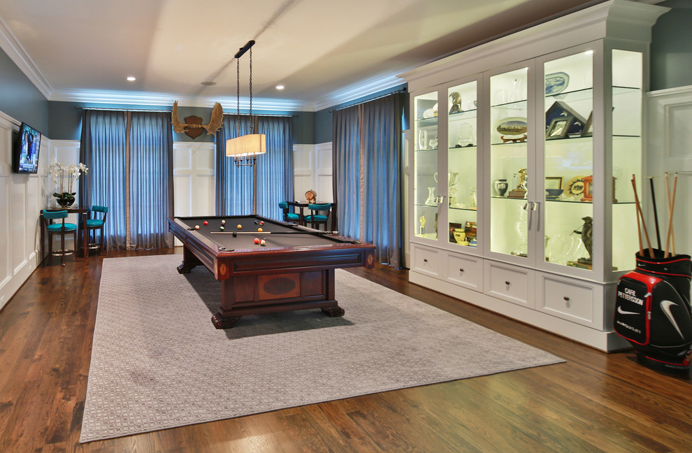 Photo of a traditional games room in Raleigh with grey walls, medium hardwood flooring, a wall mounted tv and a game room.