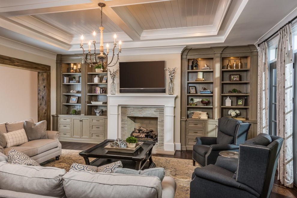 Family room - large traditional open concept family room idea in Charlotte with beige walls, a standard fireplace, a tile fireplace and a wall-mounted tv