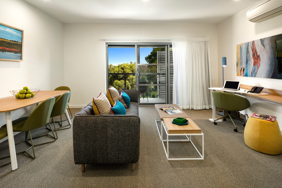 Example of a small trendy open concept carpeted and gray floor family room design in Other with white walls, no fireplace and no tv