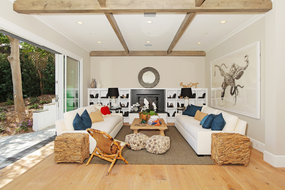 Example of a trendy family room design in Los Angeles with white walls