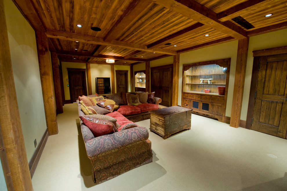 Design ideas for a large country enclosed games room in Calgary with beige walls and carpet.