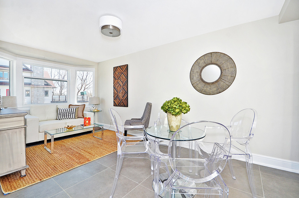 Immagine di un piccolo soggiorno minimal chiuso con pareti beige, pavimento in gres porcellanato e pavimento grigio