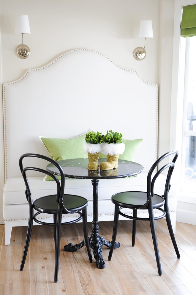 This is an example of a small classic dining room in Vancouver.