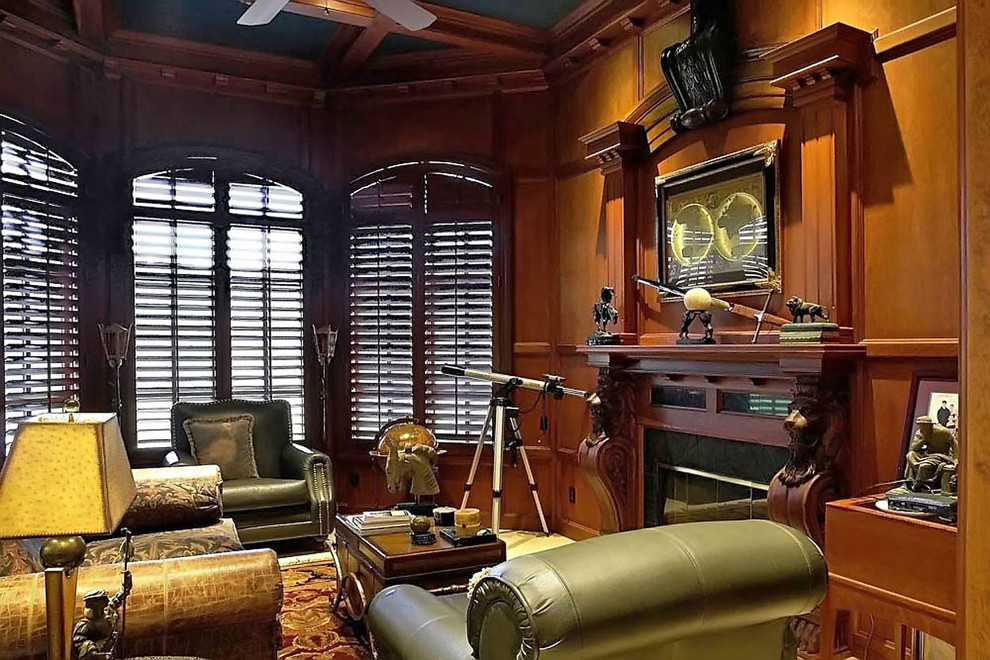 Design ideas for a classic enclosed games room in San Francisco with brown walls, a standard fireplace and no tv.