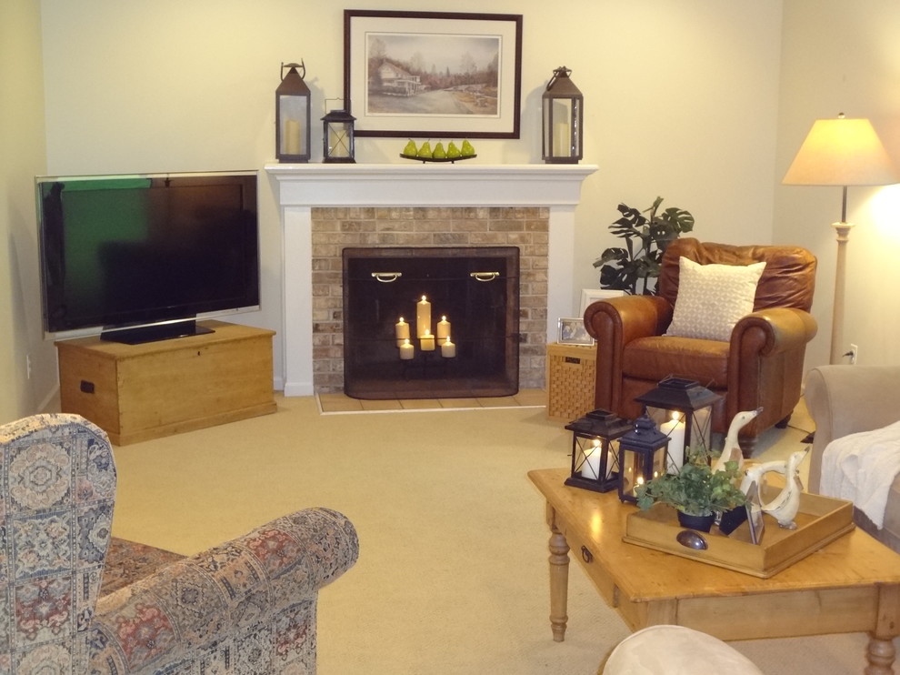 Large traditional enclosed games room in Philadelphia with beige walls, carpet, a standard fireplace, a brick fireplace surround and a corner tv.