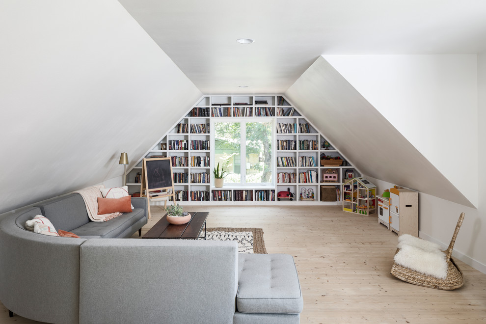 Inspiration for a mid-sized farmhouse open concept light wood floor and beige floor family room library remodel in Austin with white walls and no tv