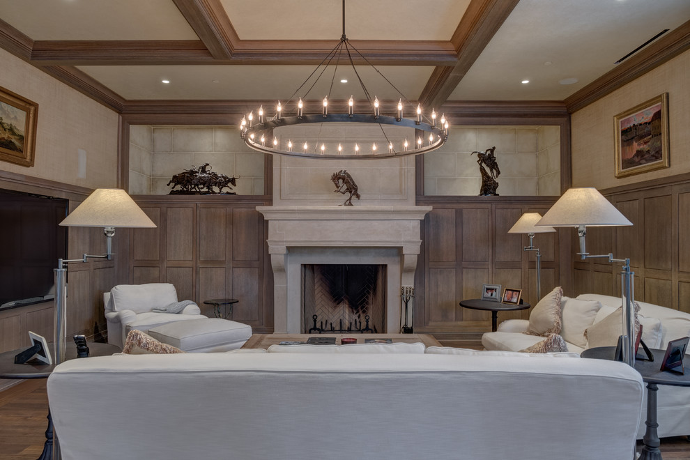 Large elegant open concept medium tone wood floor family room photo in Philadelphia with beige walls, a standard fireplace, a stone fireplace and a wall-mounted tv