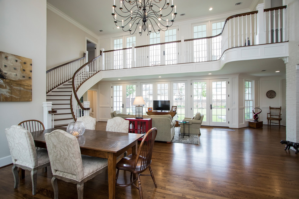 Inspiration for an expansive classic open plan games room in Houston with white walls and dark hardwood flooring.