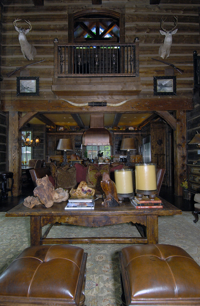 Example of a large arts and crafts loft-style dark wood floor family room design in Dallas