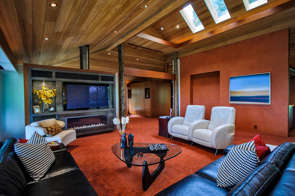 Свежая идея для дизайна: большая гостиная комната в современном стиле с красными стенами, ковровым покрытием, горизонтальным камином, телевизором на стене и красным полом - отличное фото интерьера