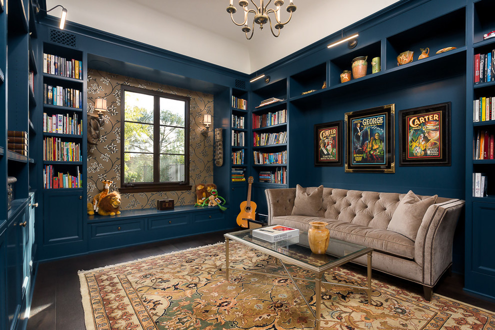 Family room library - mid-sized transitional enclosed dark wood floor and brown floor family room library idea in Los Angeles with blue walls