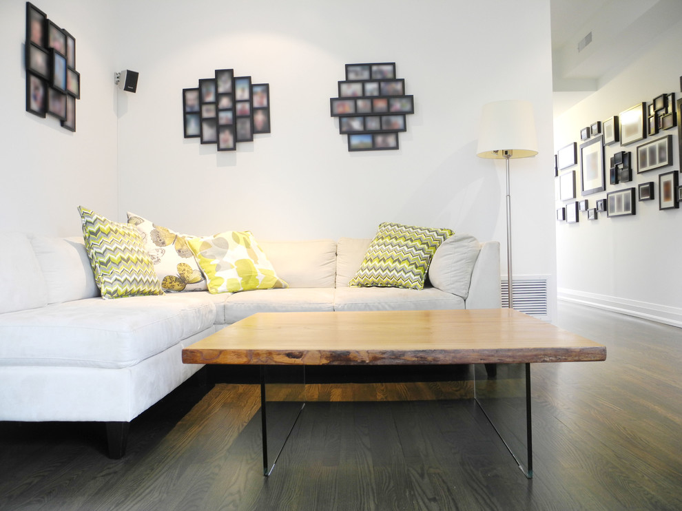 Example of a small trendy loft-style dark wood floor family room design in Toronto