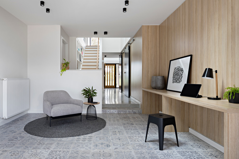 Foto di un soggiorno minimal di medie dimensioni e aperto con pareti multicolore e pavimento in gres porcellanato