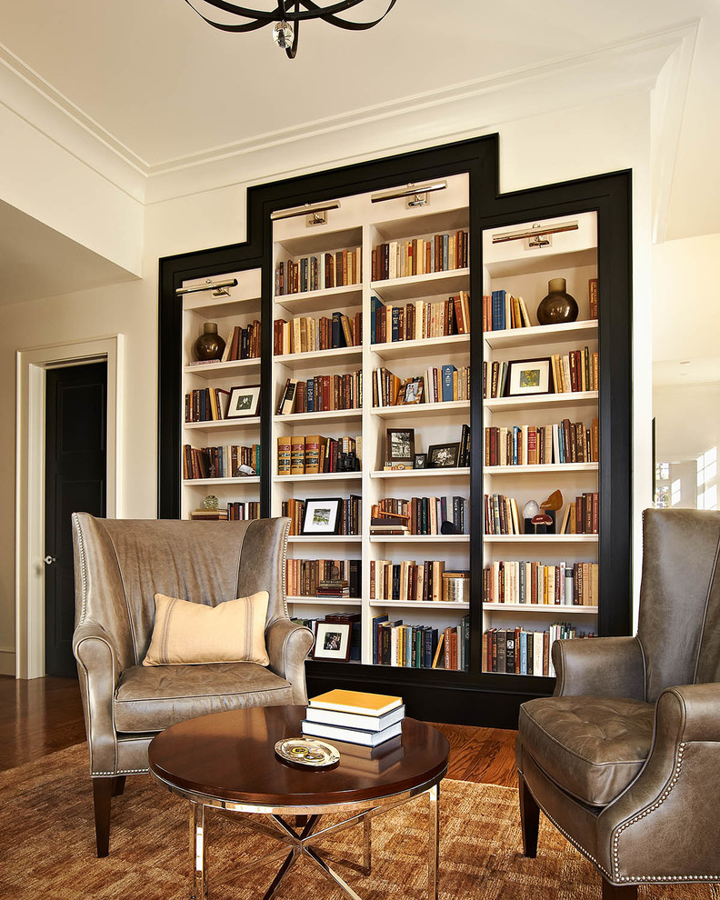 Inspiration for a transitional family room remodel in Raleigh with white walls