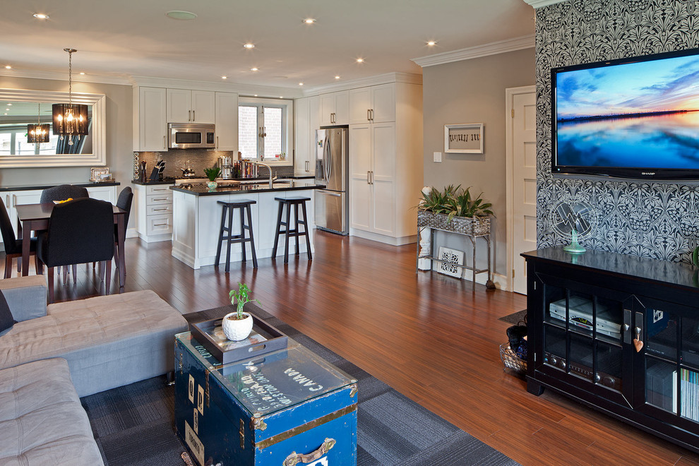 Inspiration for a transitional family room remodel in Toronto with gray walls