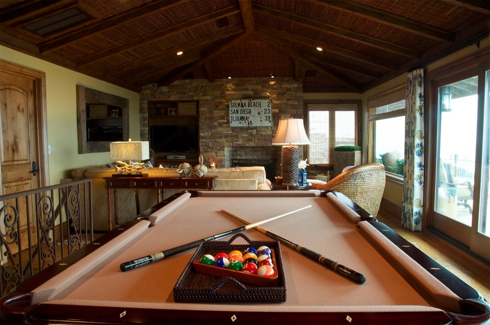 This is an example of a beach style games room in San Diego.