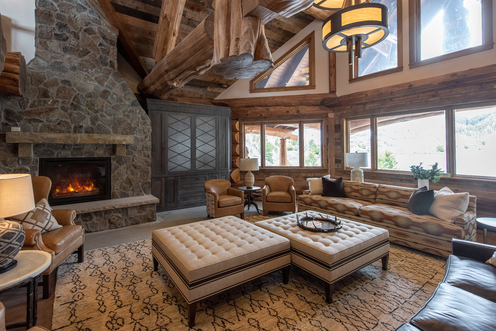 Design ideas for a rustic open plan games room in Salt Lake City with a standard fireplace and a stone fireplace surround.
