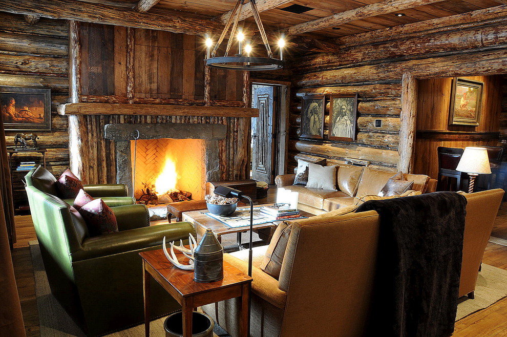 Inspiration for a rustic family room remodel in Atlanta with a wood fireplace surround