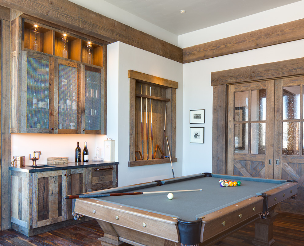 Design ideas for a rustic games room in Salt Lake City with white walls and dark hardwood flooring.