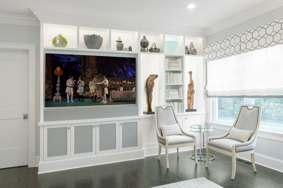 Inspiration for a medium sized coastal open plan games room in New York with grey walls, dark hardwood flooring, a standard fireplace, a stone fireplace surround, a built-in media unit and brown floors.