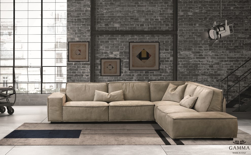 Immagine di un grande soggiorno industriale stile loft con pareti grigie, pavimento con piastrelle in ceramica, nessuna TV, pavimento grigio e tappeto
