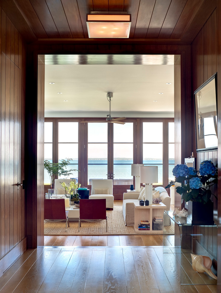 Beach style family room photo in New York