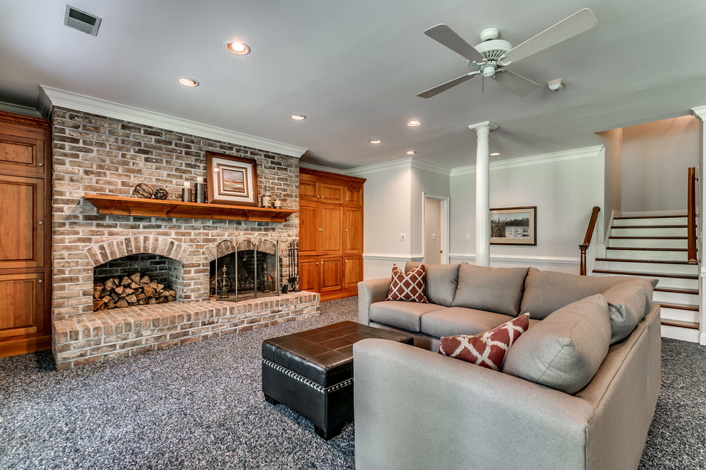 Inspiration for a traditional open plan games room in Charleston with a game room, grey walls, carpet, a standard fireplace and a brick fireplace surround.