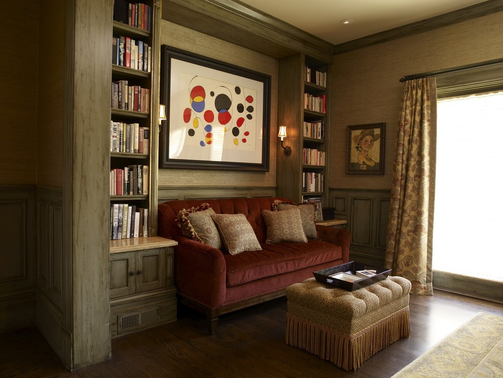 Example of a classic dark wood floor family room library design in San Francisco with beige walls
