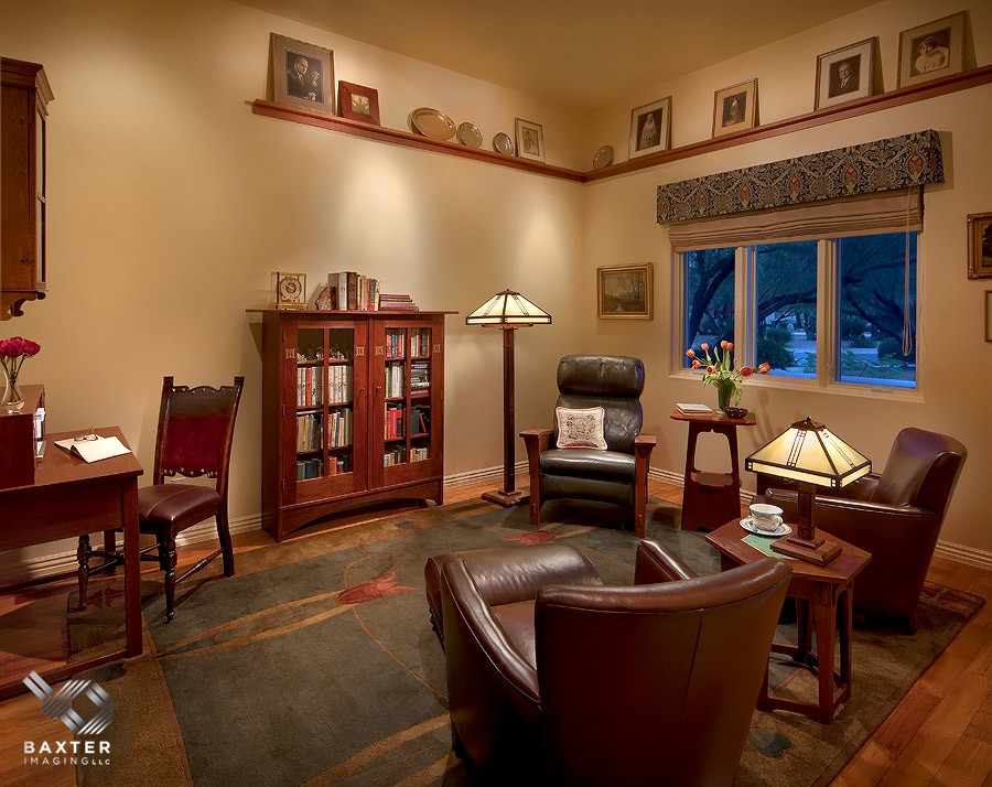 Example of a mid-sized classic enclosed light wood floor family room design in Phoenix with beige walls