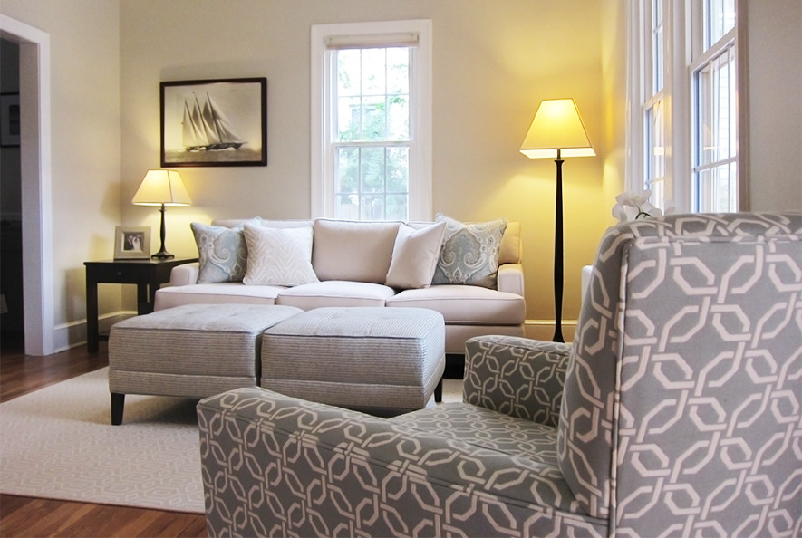 Example of a beach style family room design in DC Metro