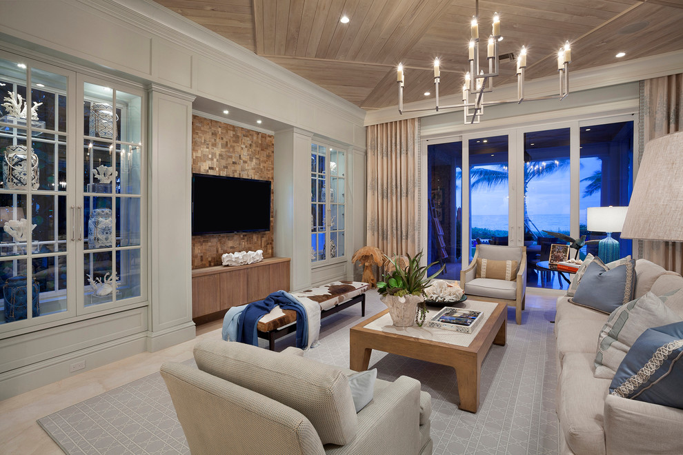 Идея дизайна: огромная открытая гостиная комната в стиле неоклассика (современная классика) с мультимедийным центром и синими стенами