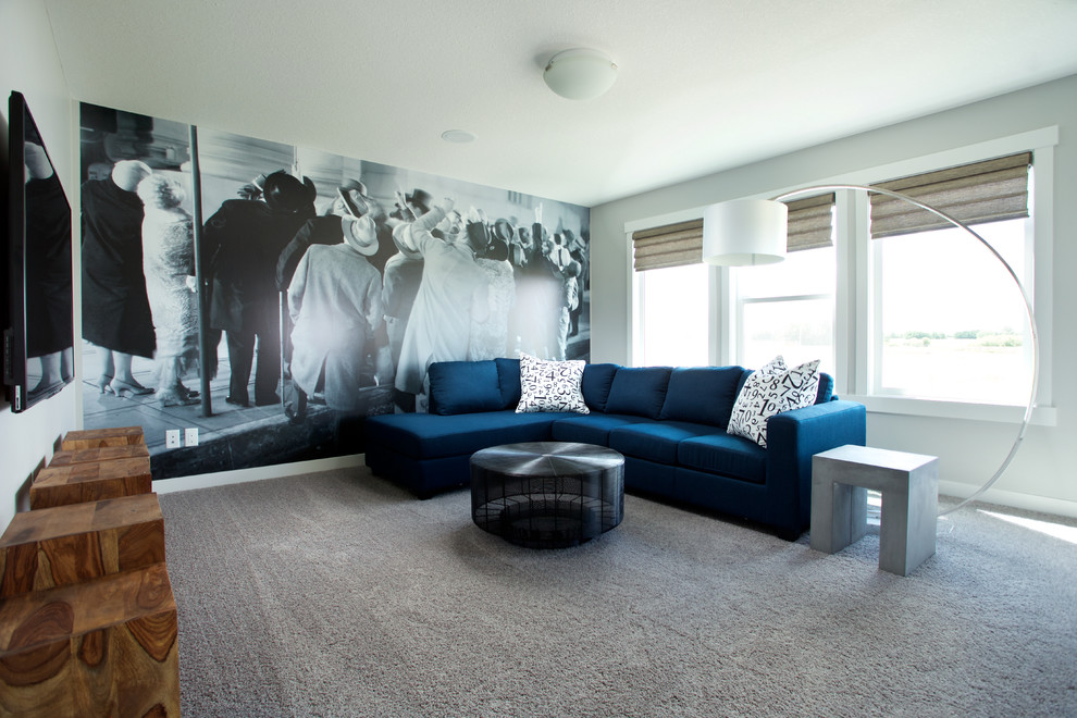 Inspiration for an eclectic loft-style carpeted family room remodel in Edmonton with gray walls