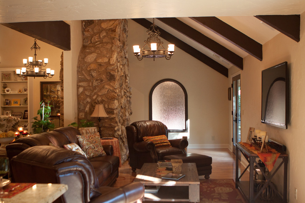 Example of a tuscan family room design in Other
