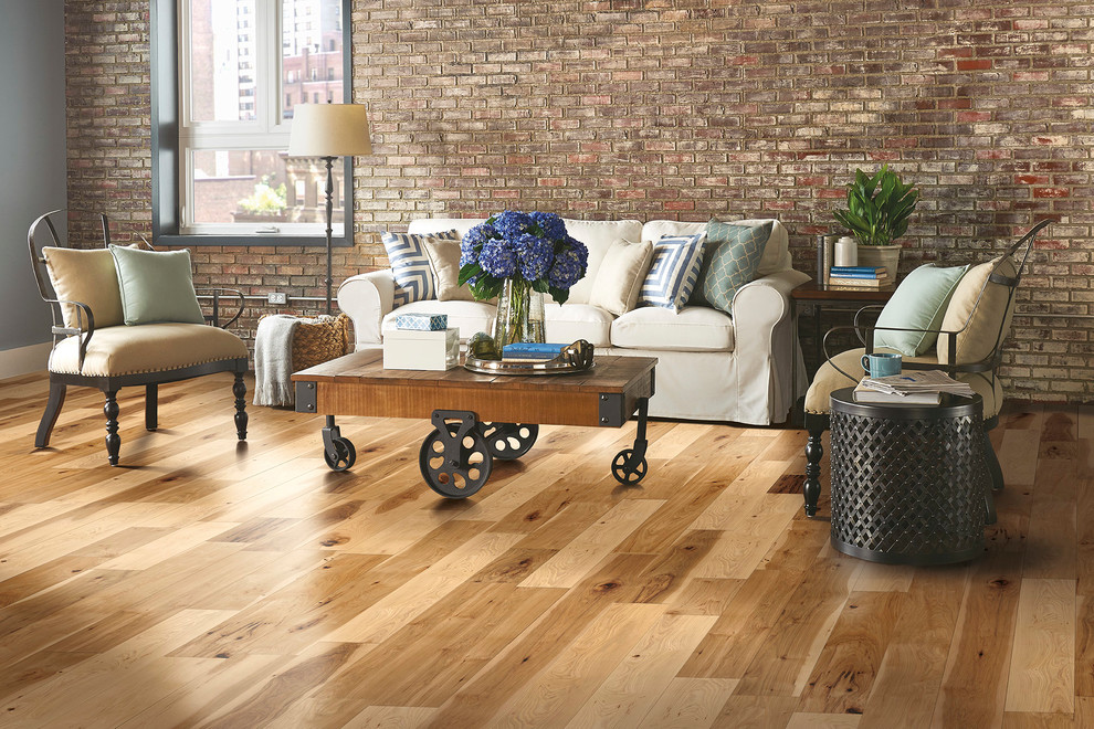Example of a trendy light wood floor and multicolored floor family room design in Other