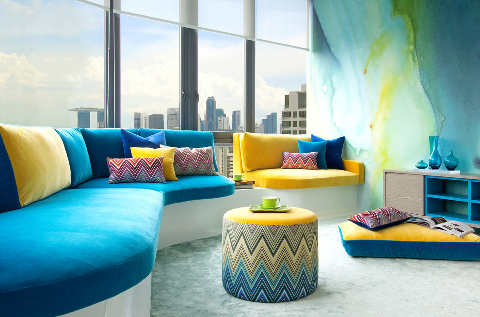 Cette image montre une salle de séjour design avec un mur multicolore, moquette, aucune cheminée et aucun téléviseur.