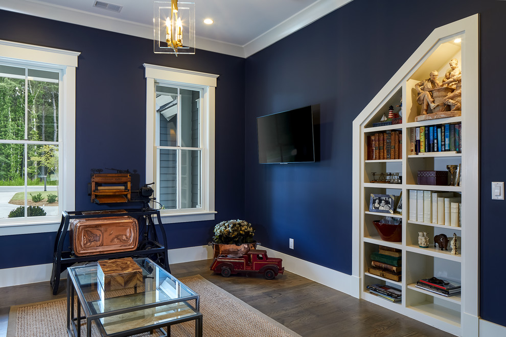 Family room - mid-sized industrial open concept dark wood floor and brown floor family room idea in Charleston with blue walls, no fireplace and a wall-mounted tv