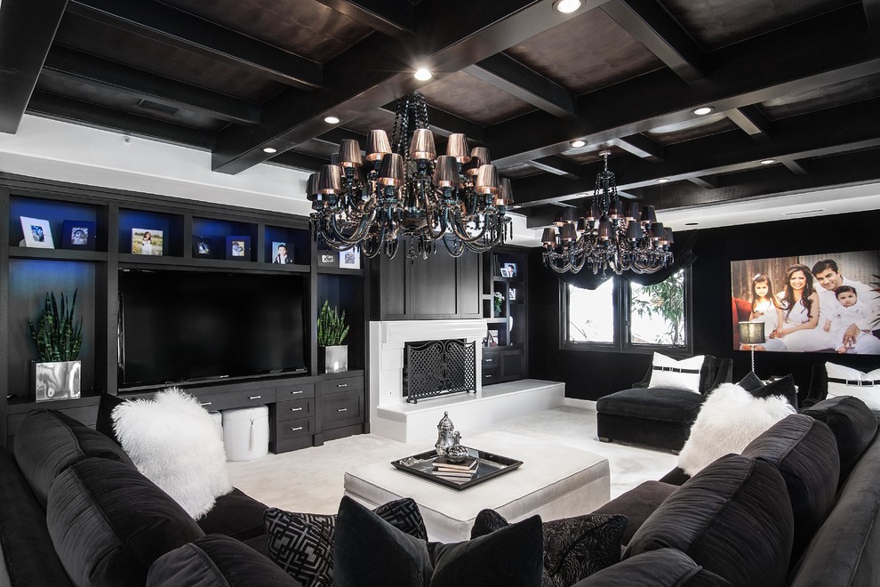 Inspiration for a contemporary enclosed carpeted family room remodel in Orange County with black walls, a standard fireplace and a media wall
