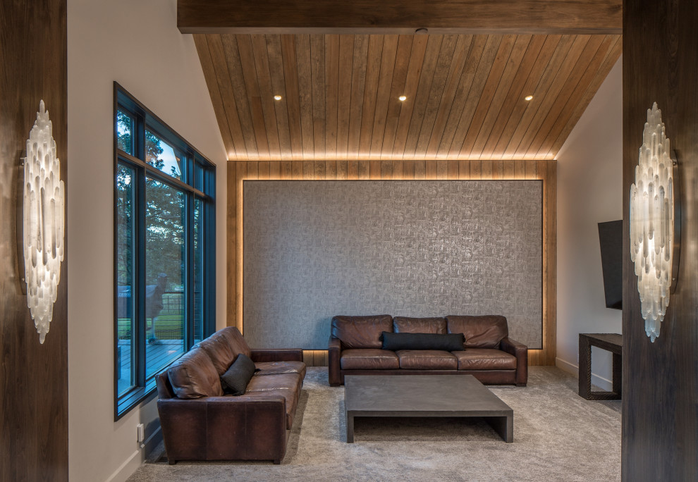 Example of a mountain style carpeted, gray floor, vaulted ceiling and wood ceiling family room design in Omaha with gray walls