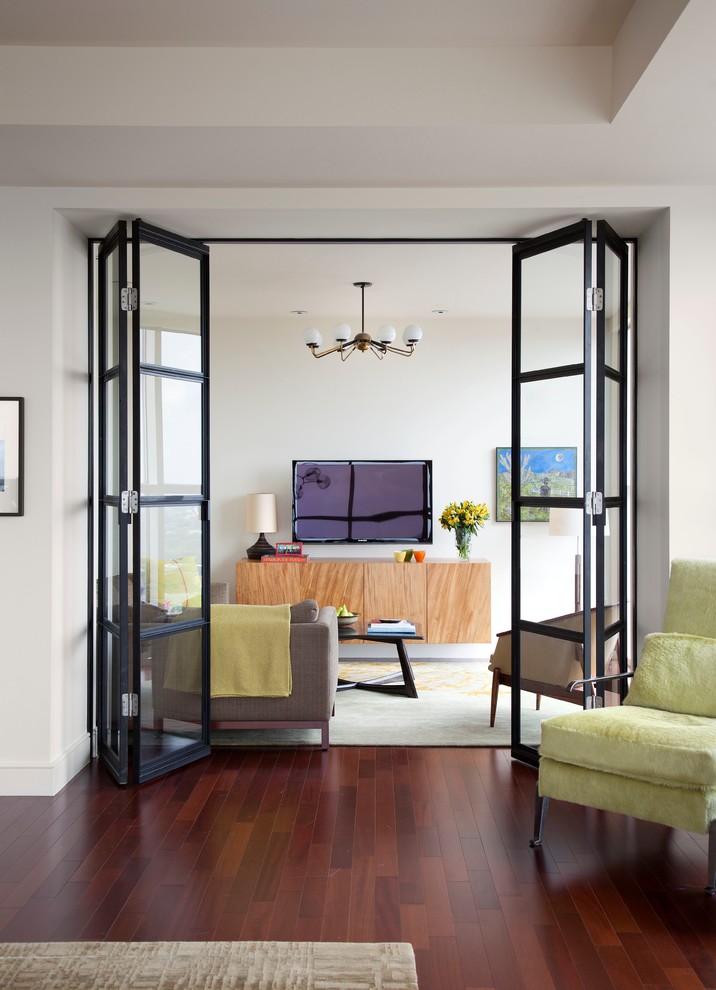 Trendy enclosed family room photo in Austin
